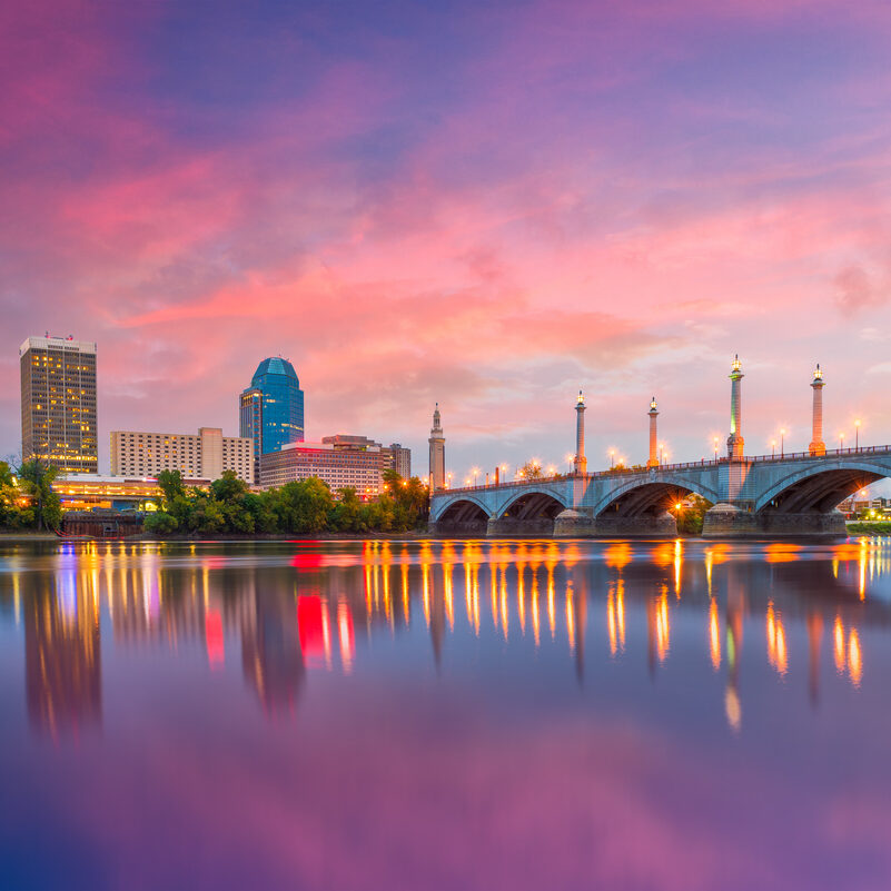 Springfield, Massachusetts, USA downtown skyline on the river at dusk.
1134856118